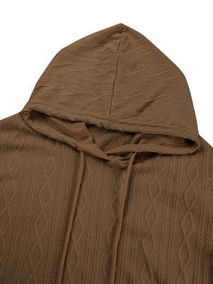 a brown sweater with a hoodie on top of it