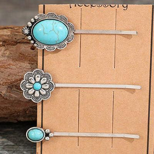 a set of three hair pins with turquoise stones