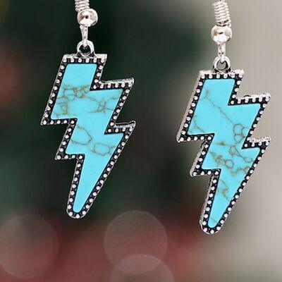 a pair of earrings with a blue lightning bolt