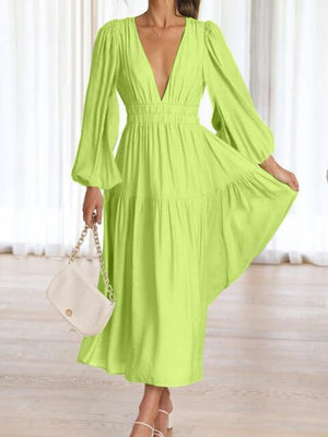 a woman in a lime green dress