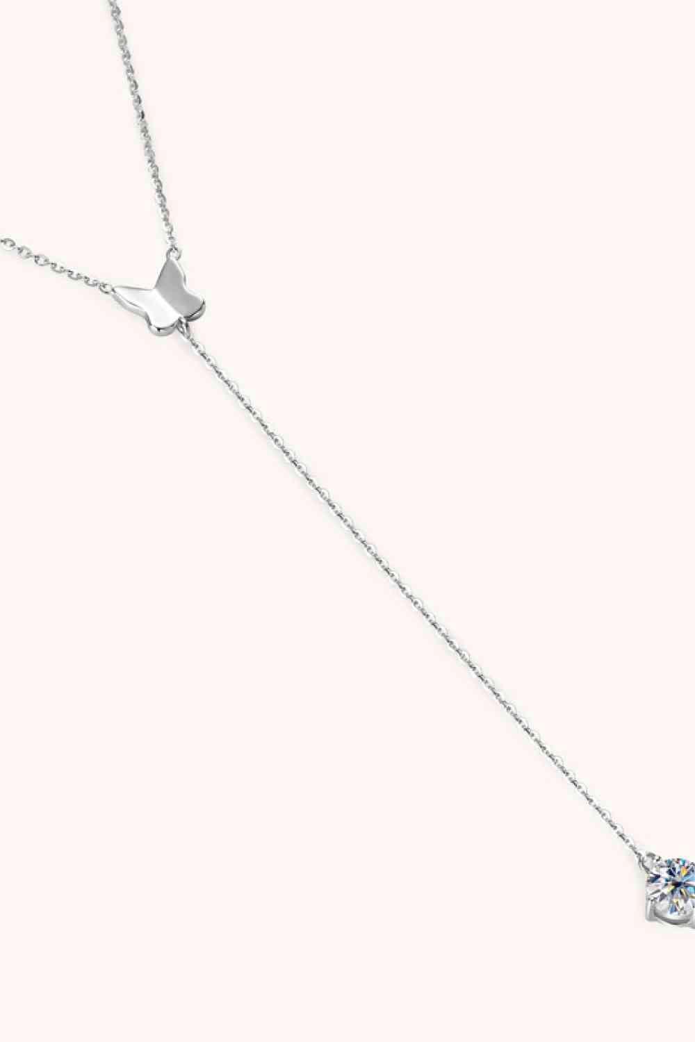 a diamond necklace on a white background