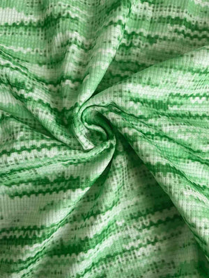 a green and white striped fabric