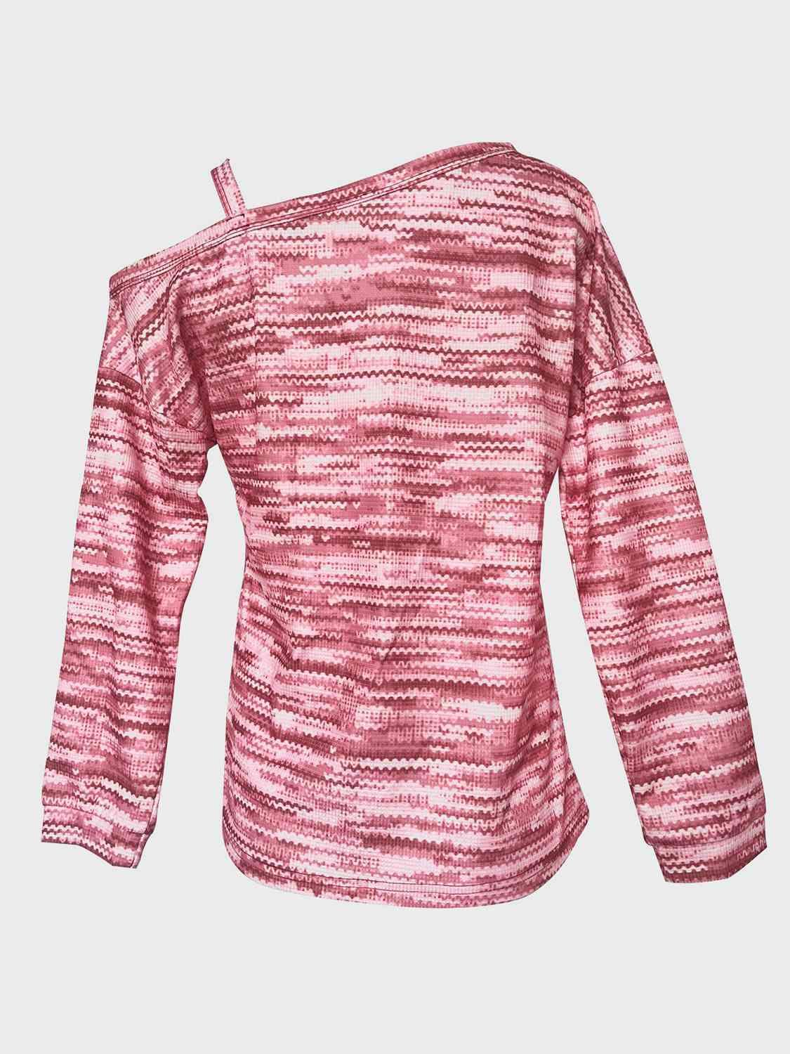 a pink top with a striped pattern on it