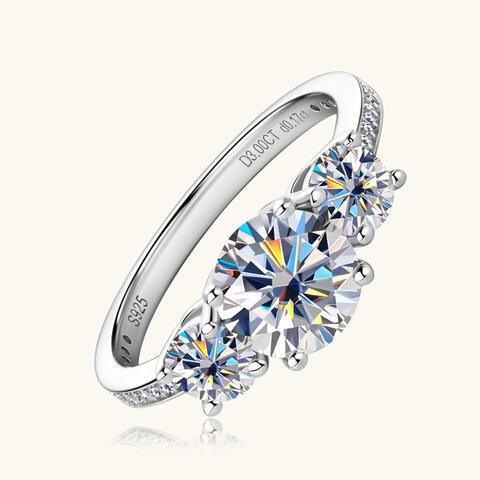 a diamond ring with three stones on it