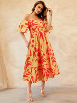 a woman in a yellow and red dress