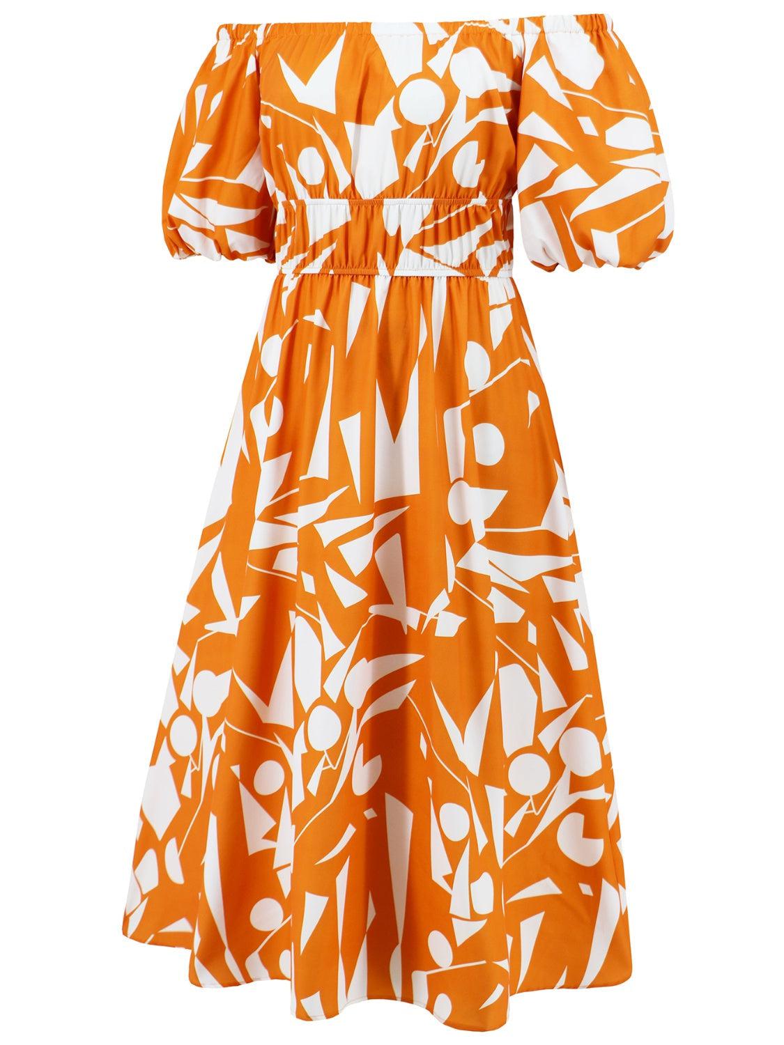 an orange and white dress with white flowers on it