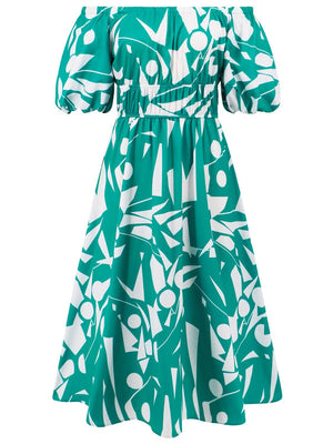 a green and white dress with a pattern on it