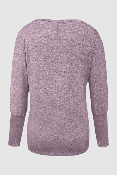 a women's sweater with a long sleeves