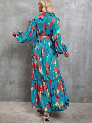 a woman in a blue floral print dress