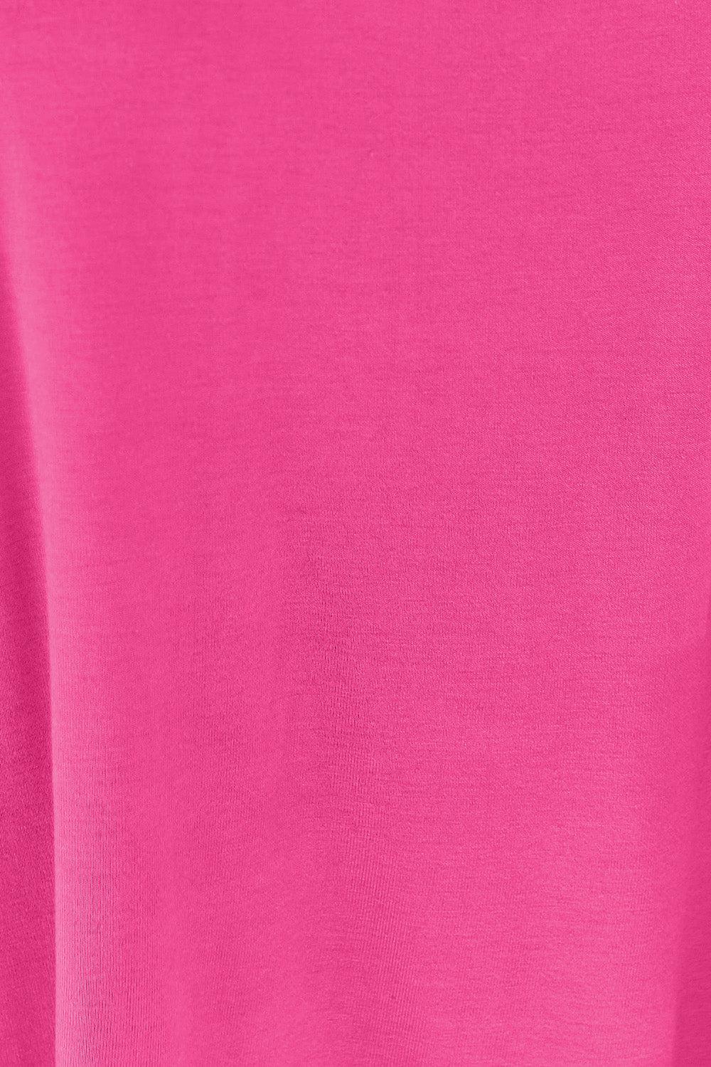 a close up of a pink t - shirt