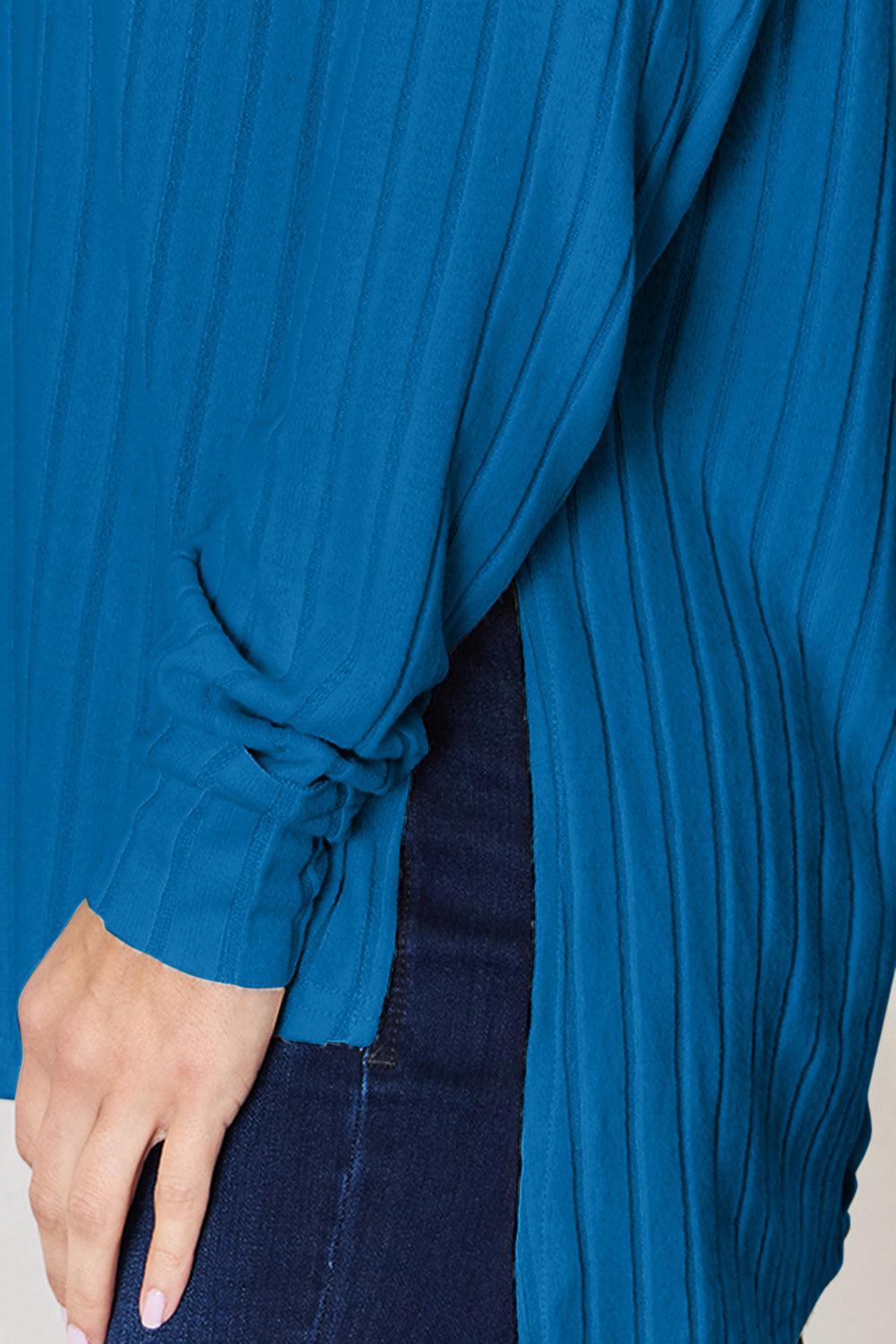 a close up of a person wearing a blue shirt