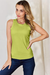 a woman wearing a lime green tank top