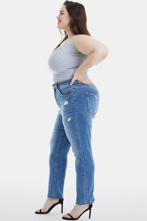 a woman in high heels and a tank top