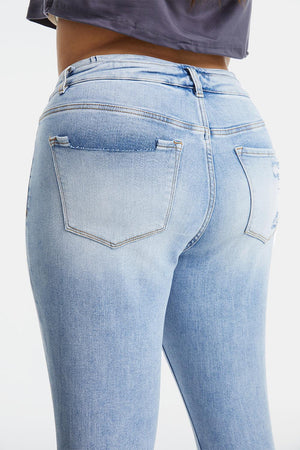 a woman's butt showing the back of her jeans