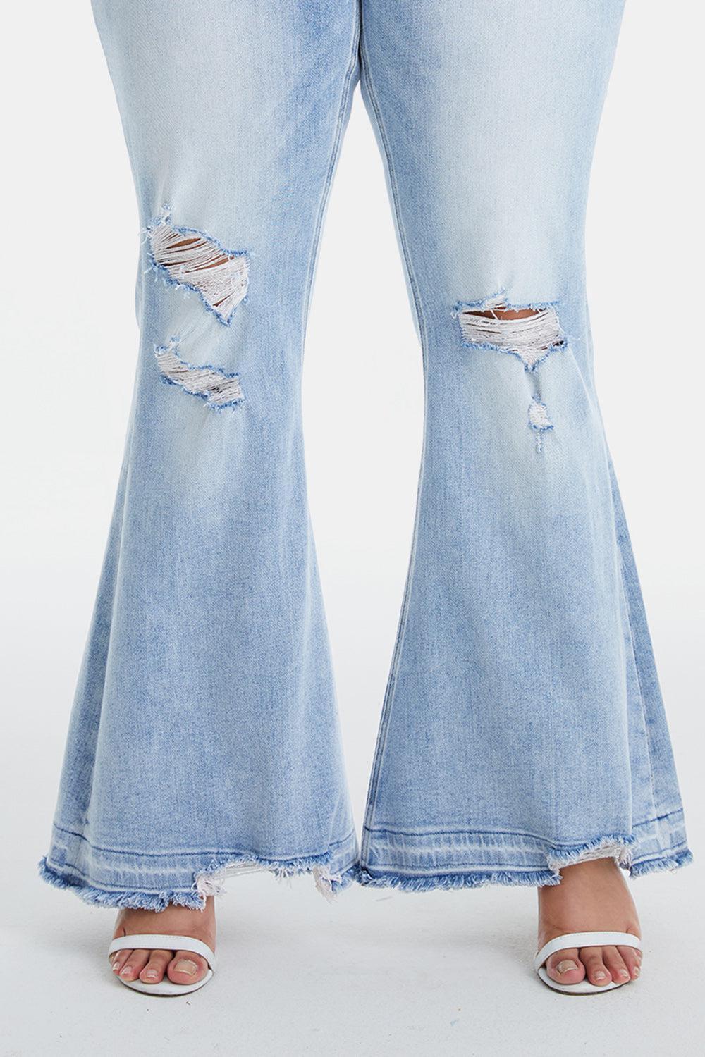a pair of blue jeans with ripped knees