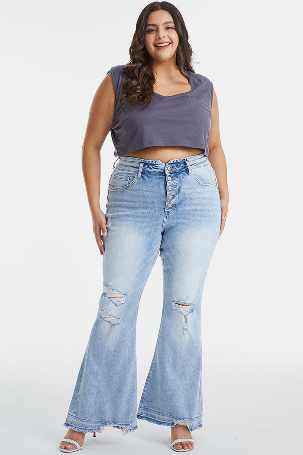 a woman in a crop top and jeans