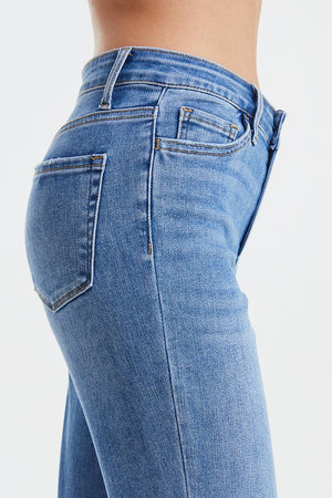 a close up of a woman's butt wearing jeans