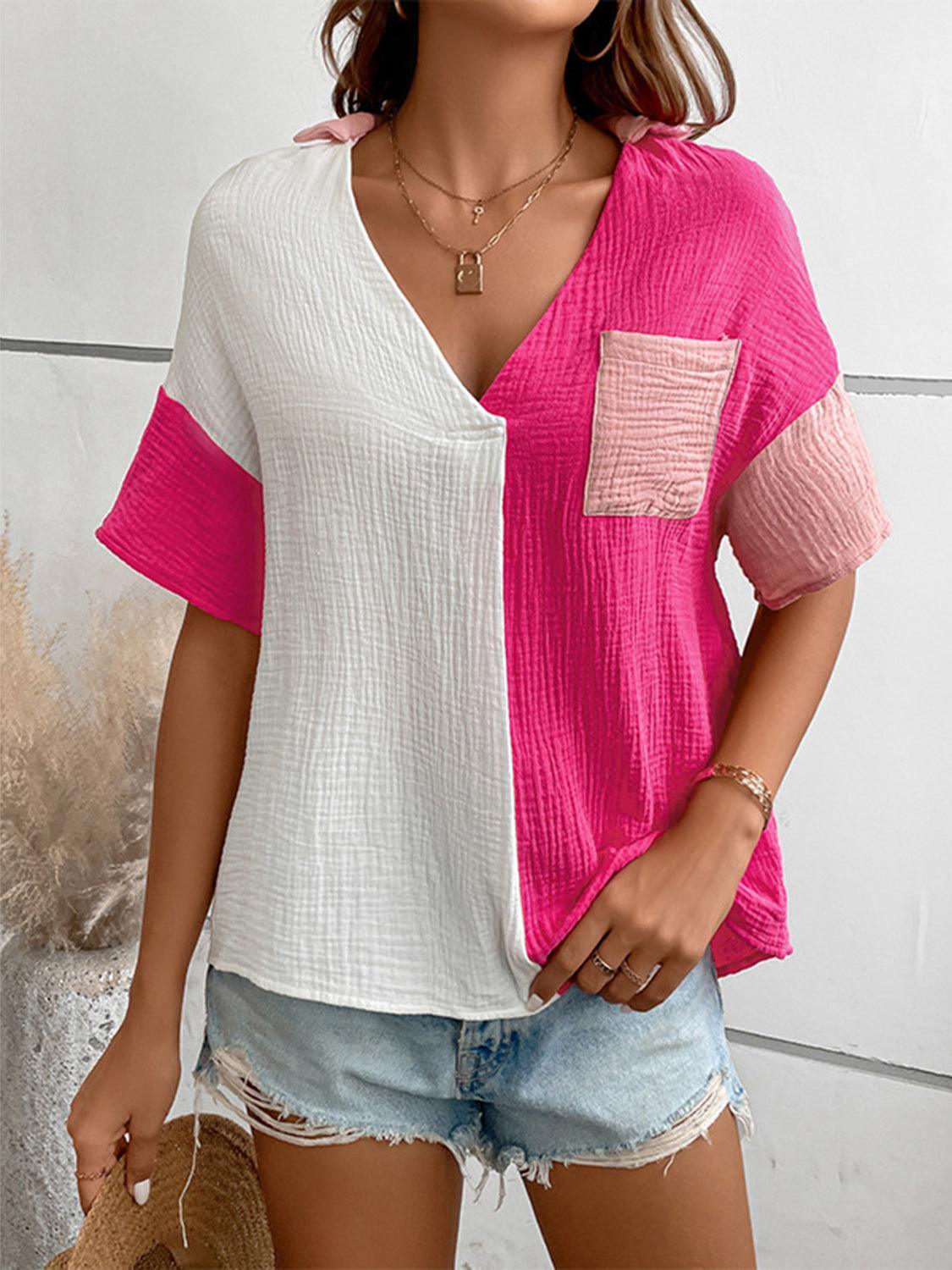 a woman wearing a pink and white top