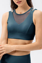 a woman in a blue sports bra top