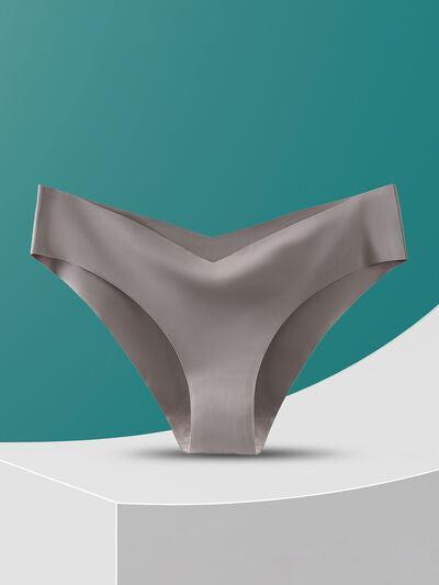 a woman's underwear is displayed on a pedestal
