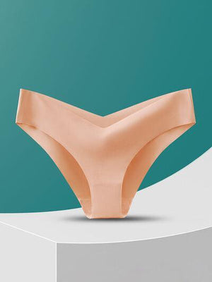 a pair of underwear sitting on top of a white pedestal