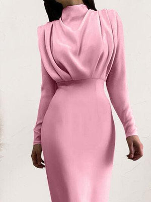 a woman wearing a pink dress with a high neck