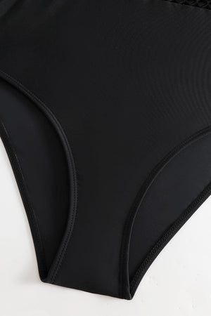 a close up of a woman's black underwear