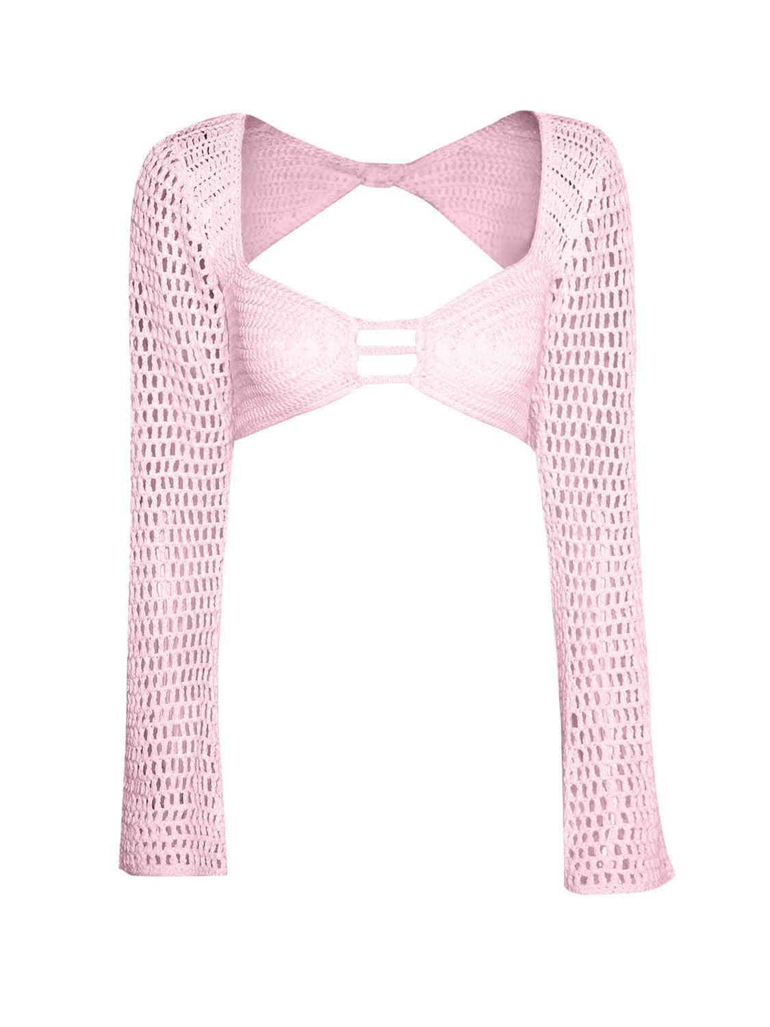 a pink crop top with a cut out back