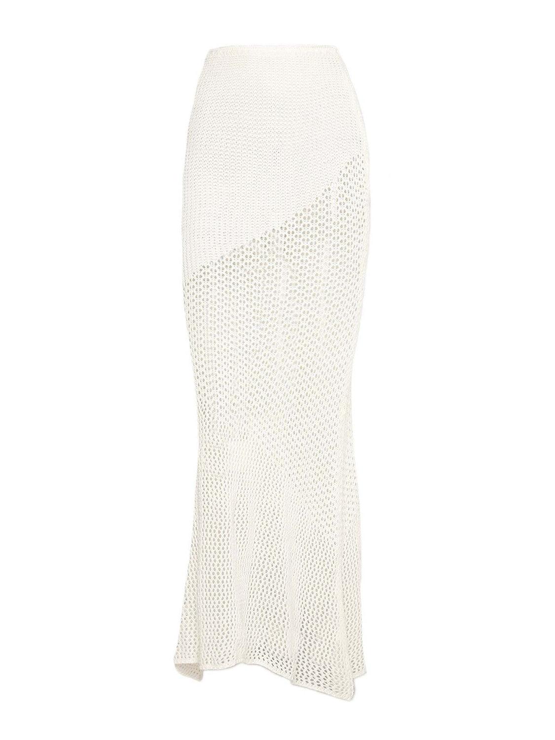 a white knitted skirt with a high slit