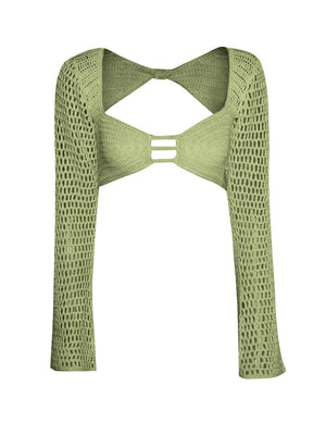 a green crop top with a cut out back