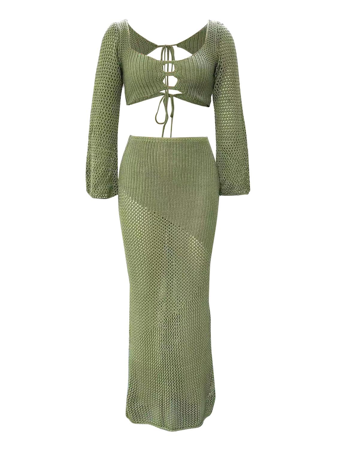 a green knitted dress with a cut out back