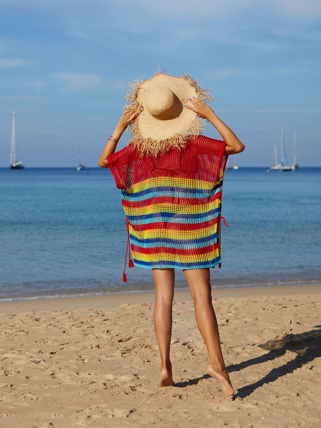 a person on a beach with a hat on