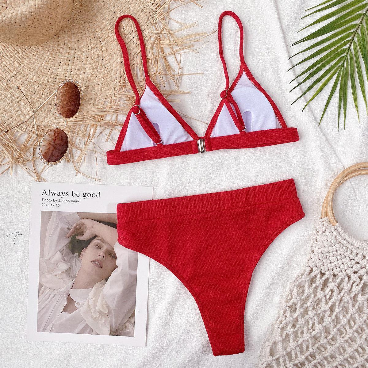 a red and white bikinisuit with a picture of a woman