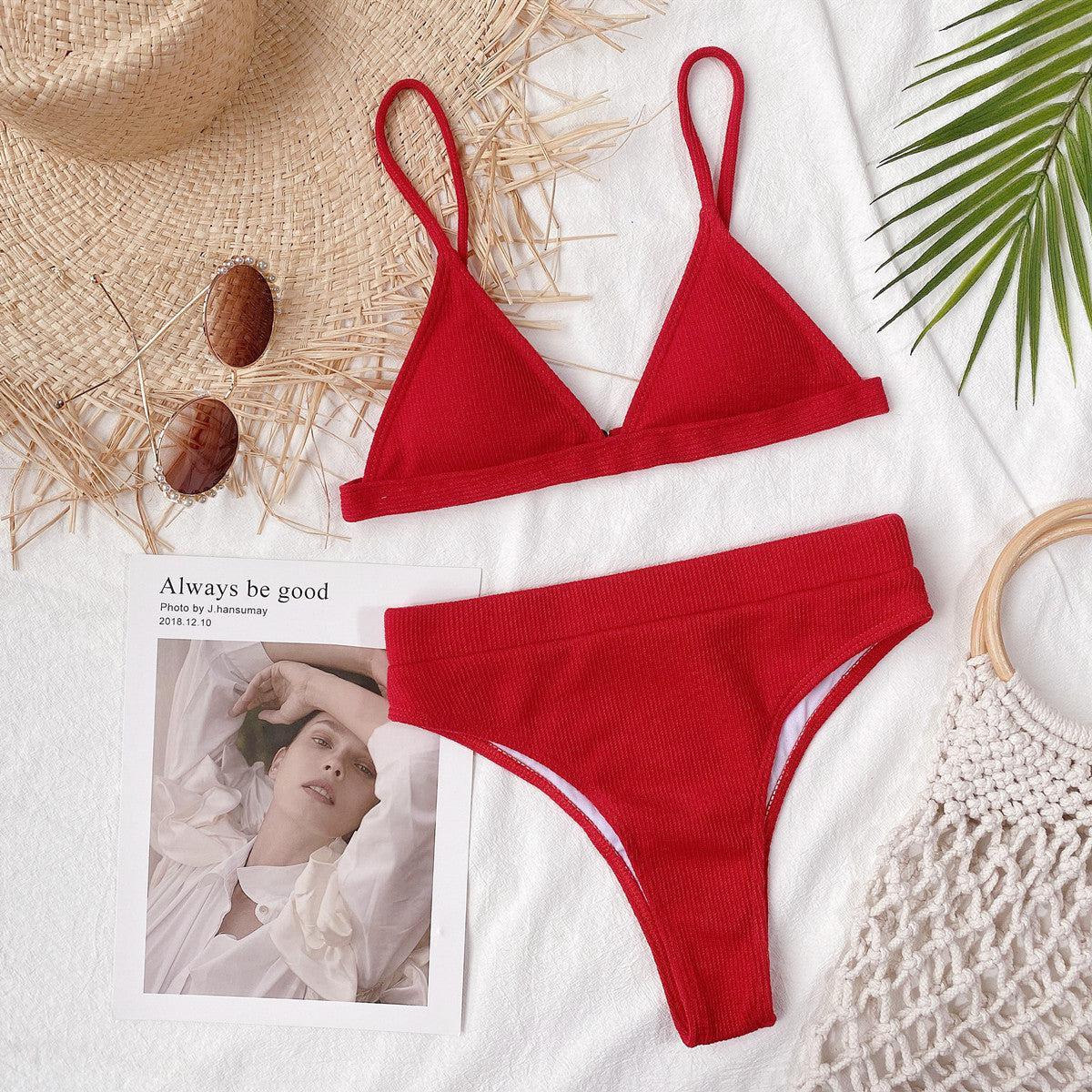 a woman's red bikinisuit with a picture of a woman's face