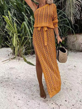 a woman wearing an orange knitted dress