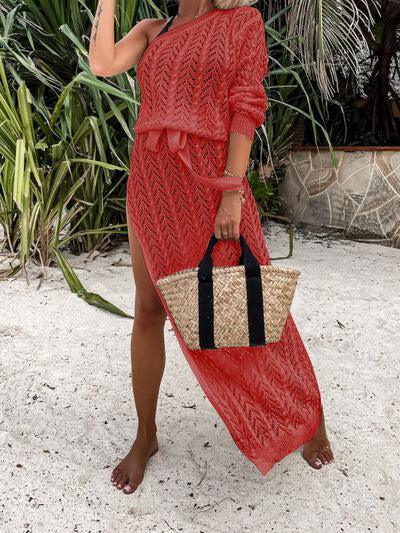 a woman in a red dress holding a straw bag