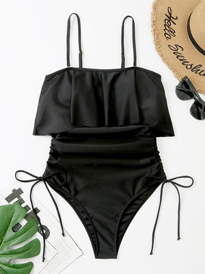 a bathing suit and hat on a white background