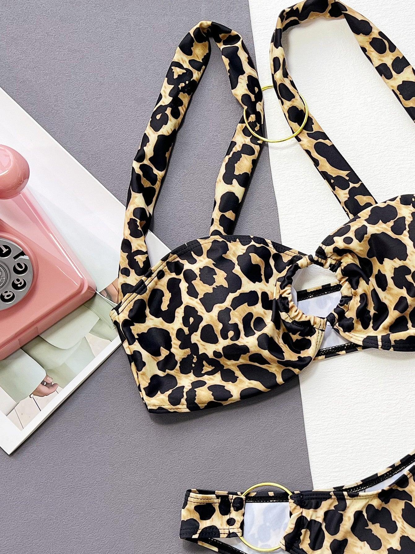 a cell phone and a pair of leopard print headbands