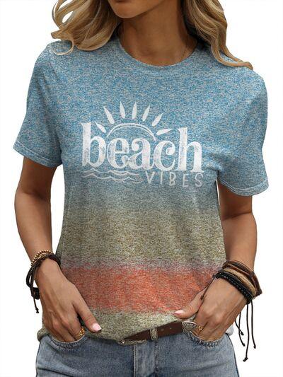a woman wearing a beach vibe t - shirt
