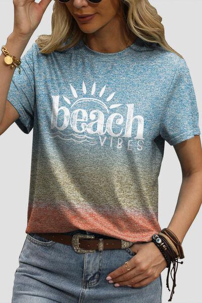 a woman wearing a beach vibes t - shirt