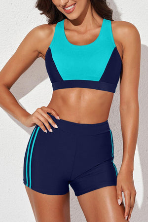 a woman in a sports bra top and shorts