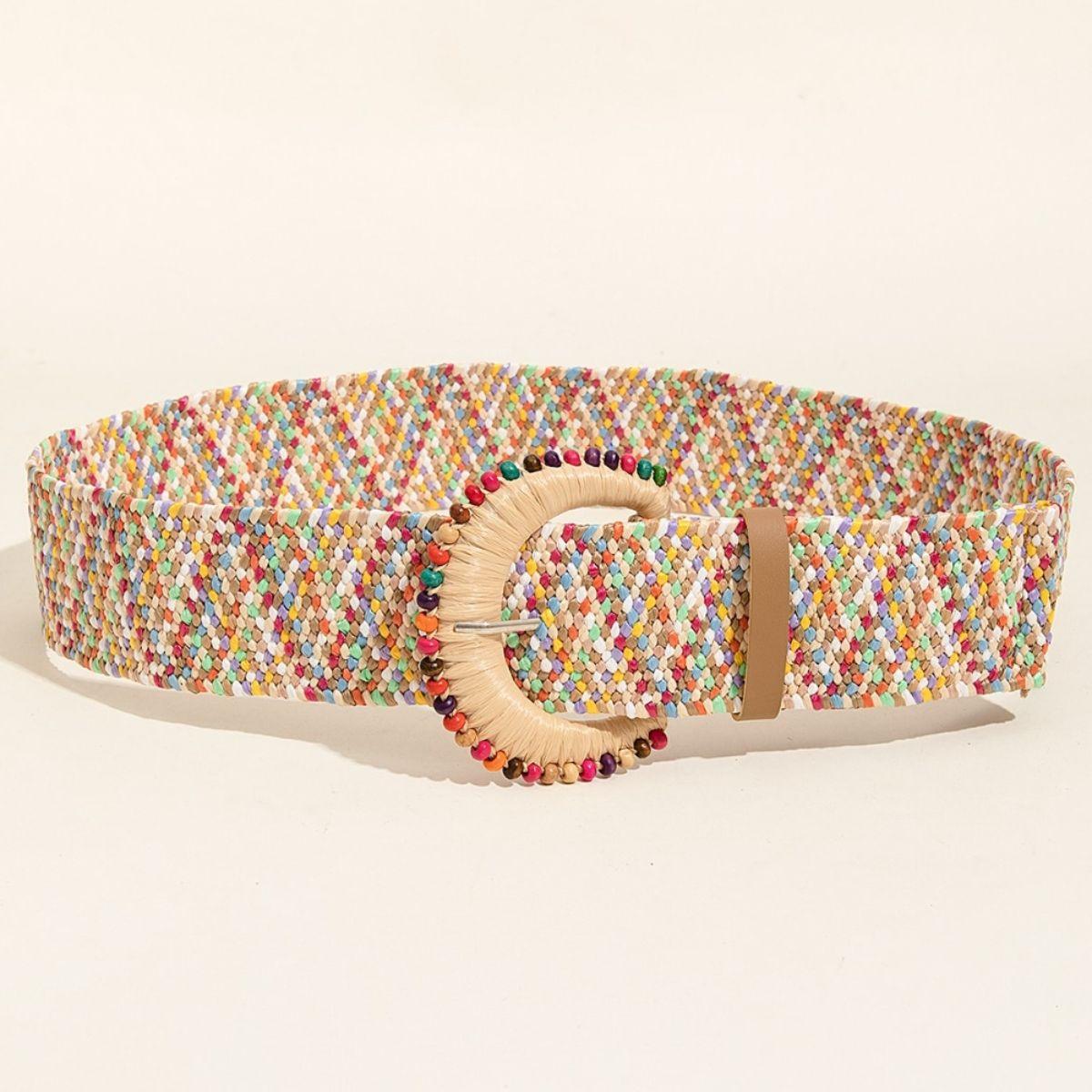 a multicolored belt with a gold buckle