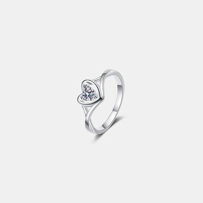 a white gold ring with a heart shaped diamond