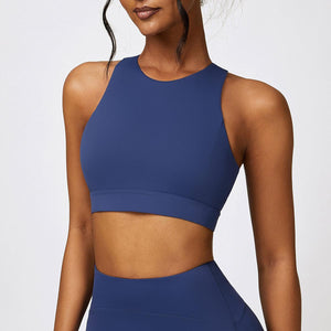 a woman in a blue sports bra top