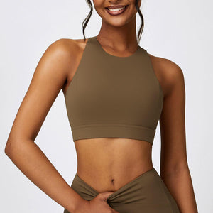 a woman in a brown sports bra top