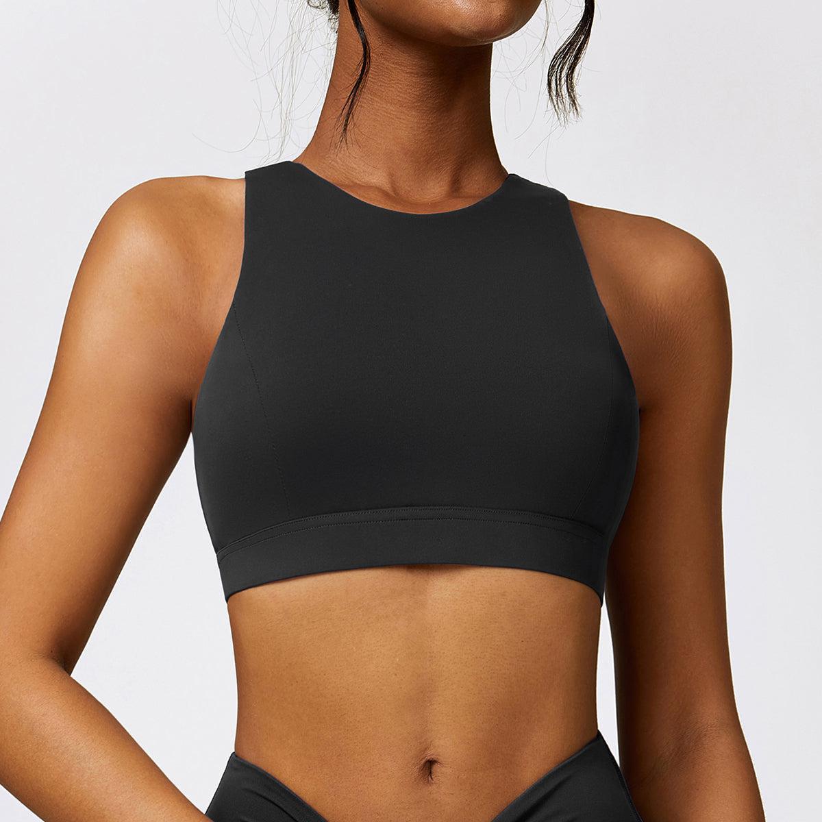 a woman in a black sports bra top