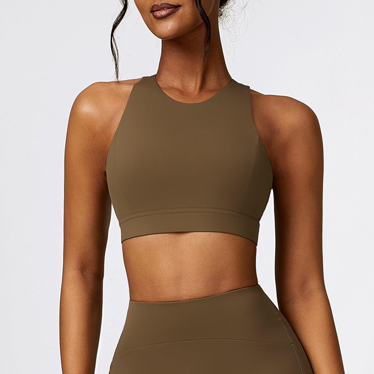 a woman in a brown sports bra top