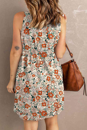 a woman in a floral dress holding a brown purse