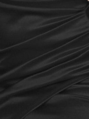 a close up of a woman wearing a black dress