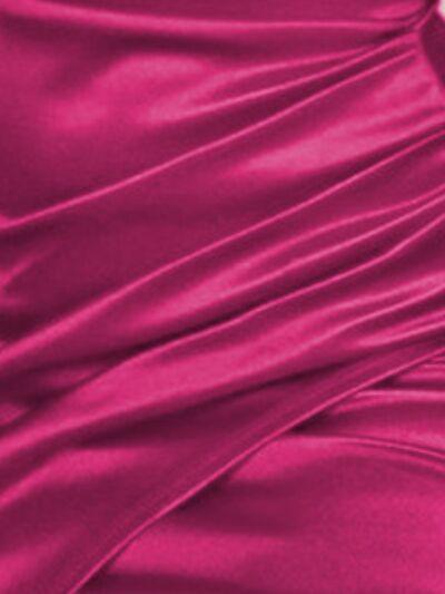 a close up of a woman's pink dress